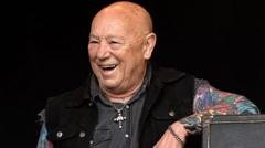 Angry Anderson, rock star who soundtracked Kylie’s wedding in Neighbours, dies aged 79